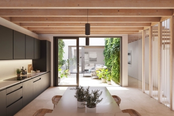 Private patio residence with expansive living spaces and rooftop solarium